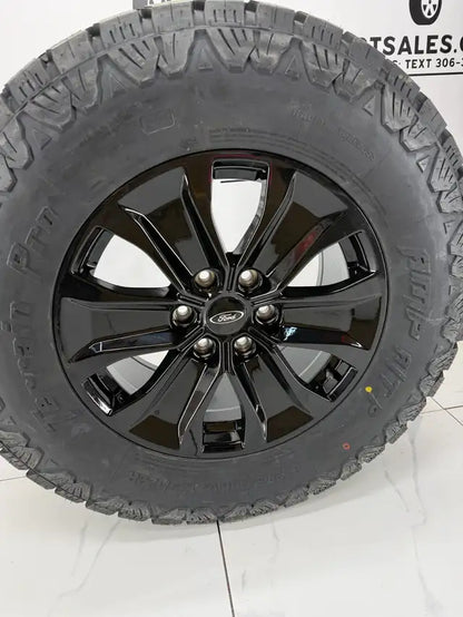 LT 275/70/18 AMP Pro tires on 18x8.5 Replica R250 rims 6x135