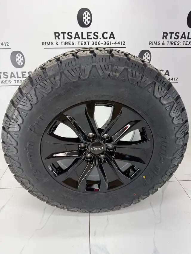 LT 275/70/18 AMP Pro tires on 18x8.5 Replica R250 rims 6x135