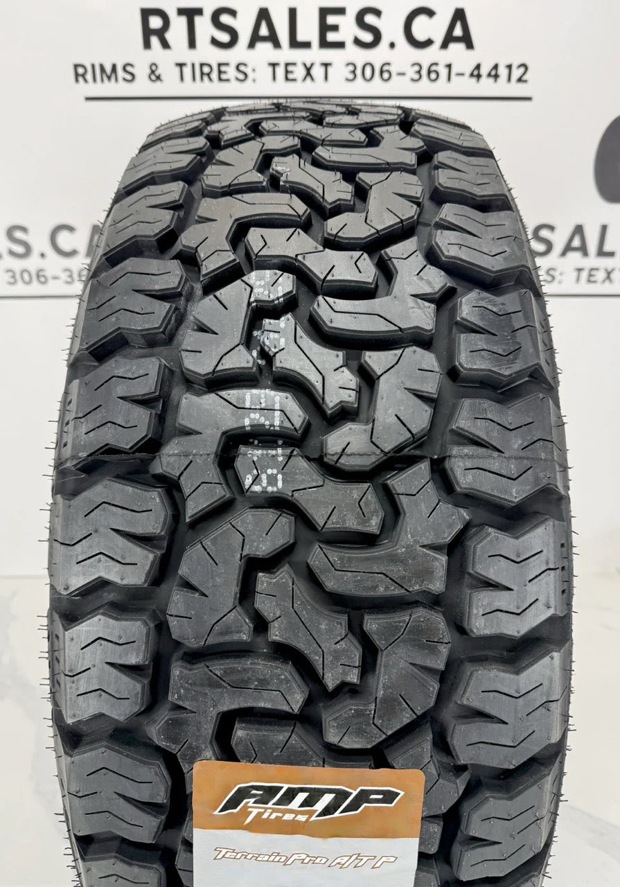 LT AMP Pro All Terrain Tires on 20" Rims 6x139.7