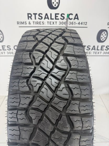 Goodyear Wrangler Territory MT LT305/70R18 tread pattern — full-depth new takeoff tire