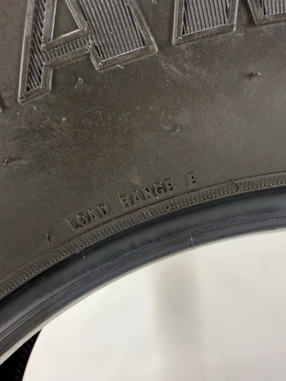Load Range E marking on Goodyear Wrangler Territory MT LT305/70R18 takeoff tire