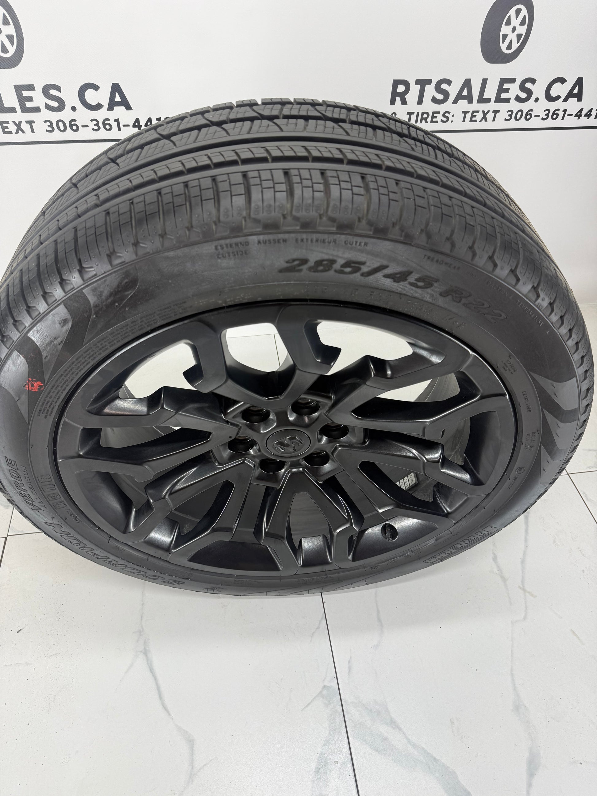 Side profile of 285/45R22 Pirelli Scorpion Verde tire on Ram 1500 OEM wheel