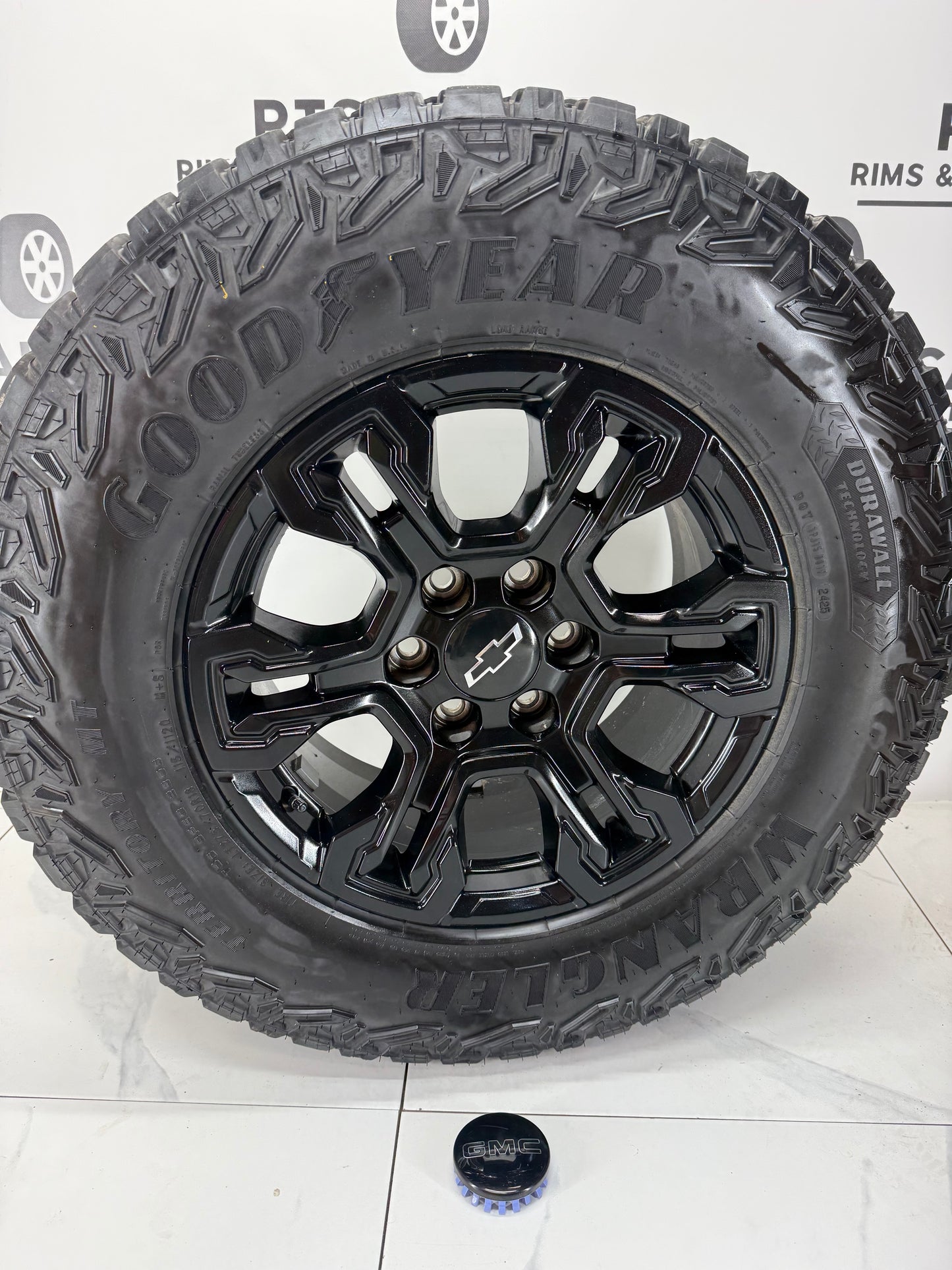 2025 Silverado ZR2 gloss black OEM wheel with Goodyear Territory MT - R&T Sales