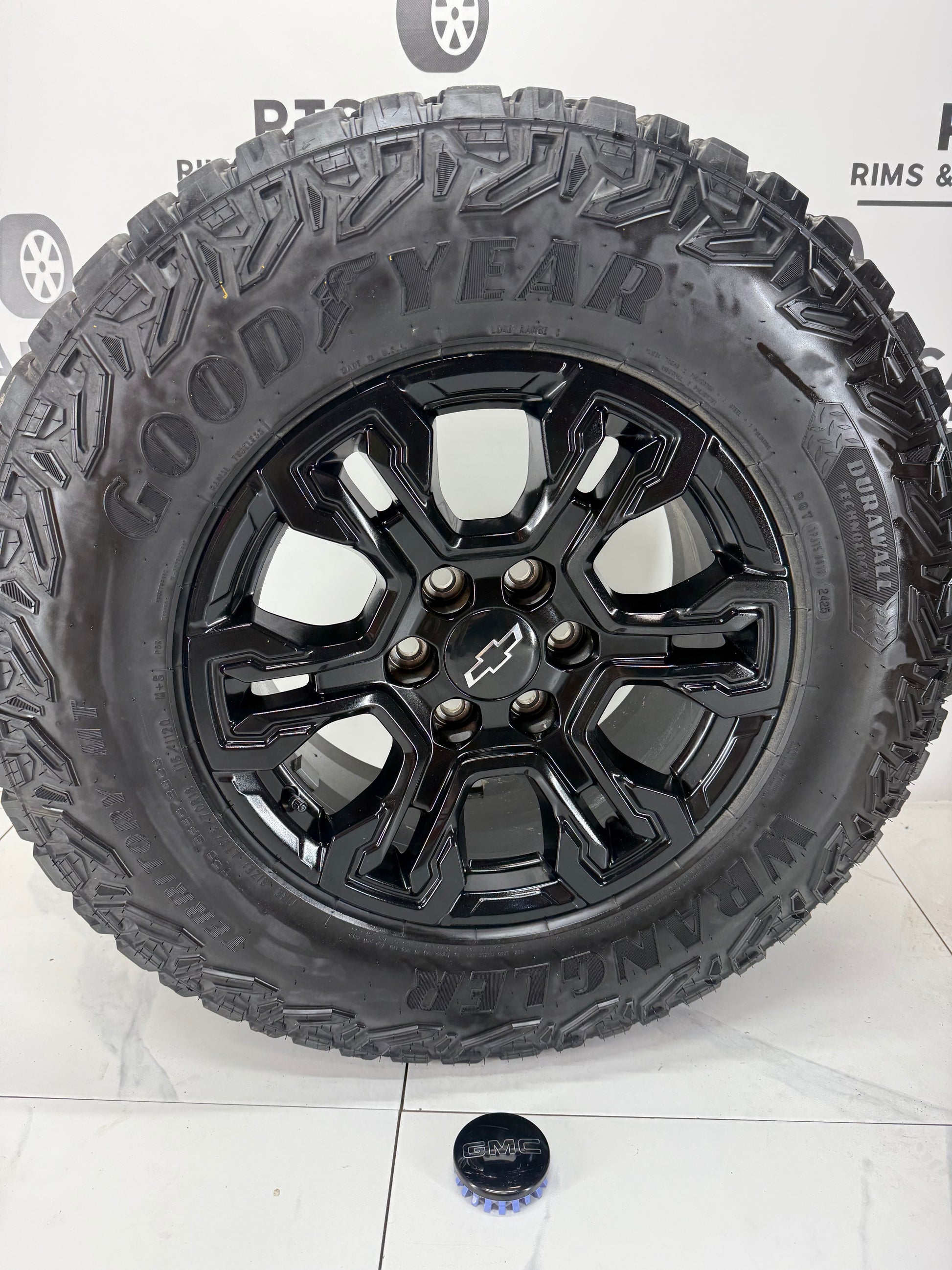 2025 Silverado ZR2 gloss black OEM wheel with Goodyear Territory MT - R&T Sales