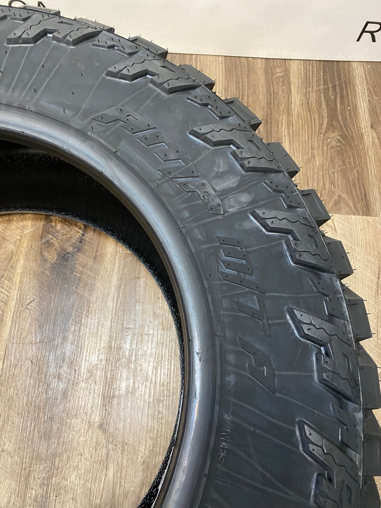 LT 35x11.5x20 Amp M/T Mud tires / 10 ply.   (four tires)
